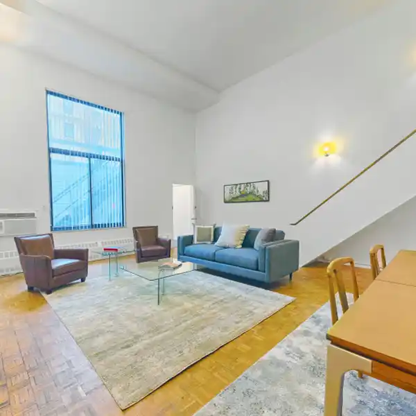CAVERNOUS TWO BEDROOM CHELSEA TRIPLEX