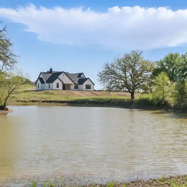 STUNNING NEW BRICK HOME ON 10 ACRES