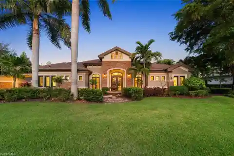 Grand Covered Portico with Dual Garages