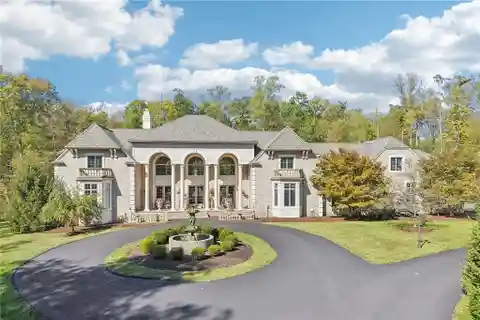 Gated Brick Villa with Lavish Garden Courtyard