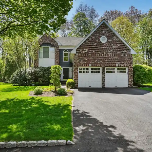 PRIVATE COLONIAL WITH A SPRAWLING YARD