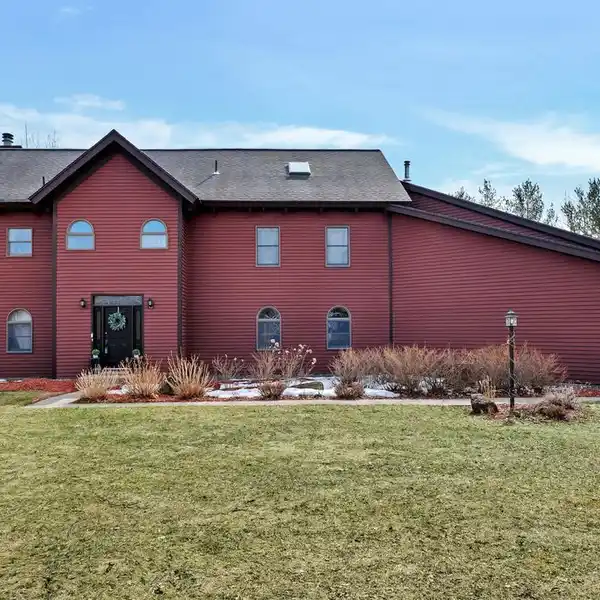 REMARKABLE HOME ON TWO PRIVATE ACRES