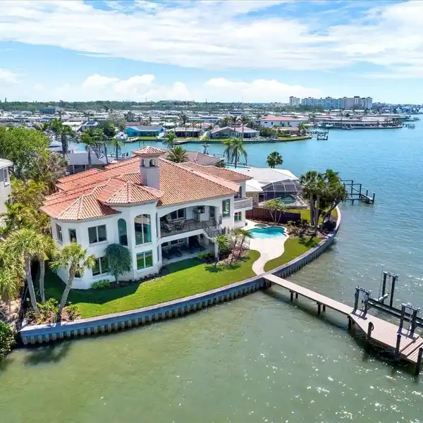 WATERFRONT MASTERPIECE IN PRESTIGIOUS OAKHURST SHORES