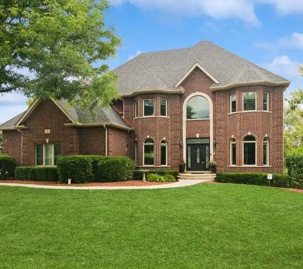 BEAUTIFULLY APPOINTED RESIDENCE ON A LUSH LOT