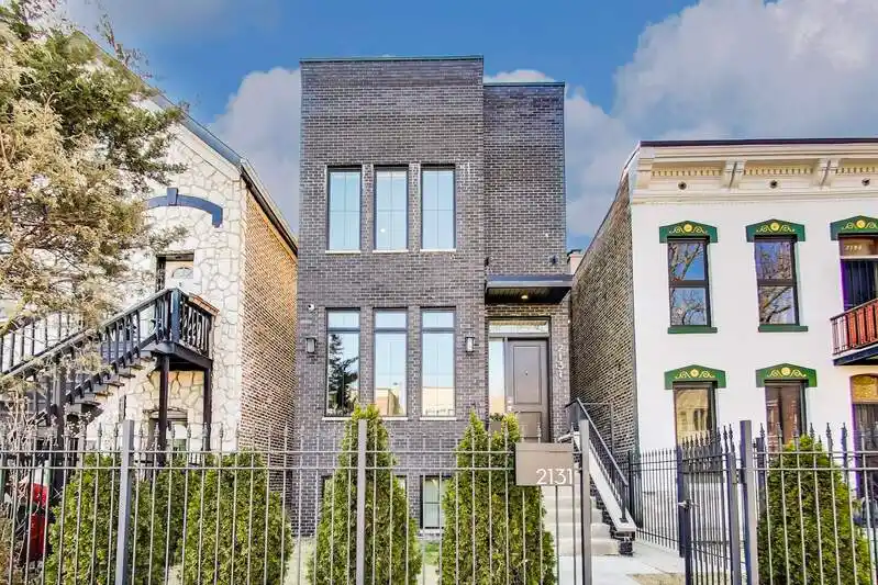 Exquisite Brick Home with Rooftop Oasis and Skyline Views
