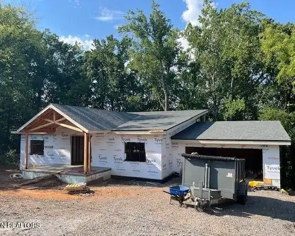 ENERGY-EFFICIENT HOME BACKING TO NATURAL SPRING