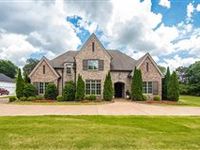 SOPHISTICATED FIVE-BEDROOM IN GATED COMMUNITY