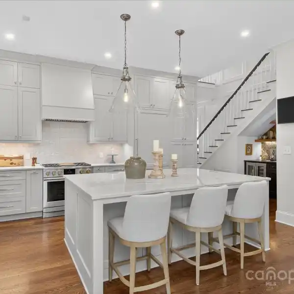 SOPHISTICATED TOWNHOME WITH CUSTOM CABINETRY, BEVERAGE BAR AND MEDIA ROOM