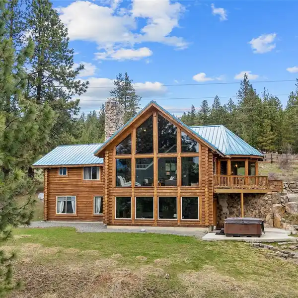 LOG HOME ON THREE PRIVATE ACRES