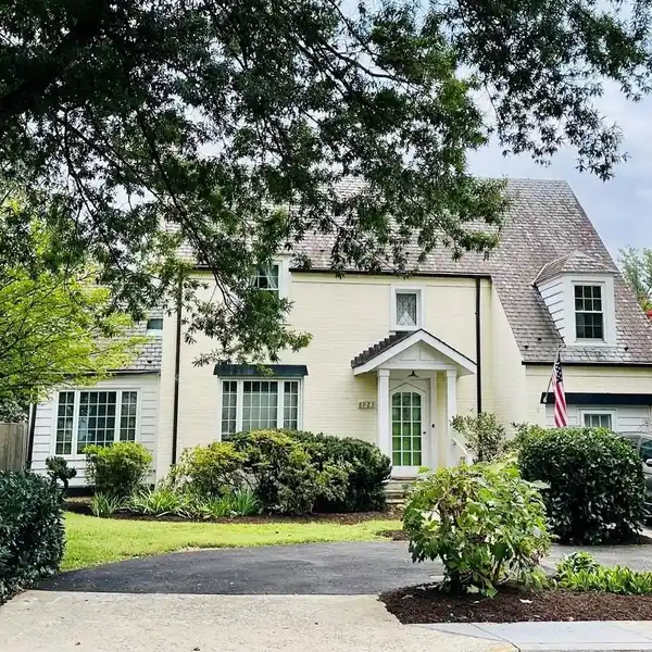 LOVINGLY MAINTAINED AND THOUGHTFULLY EXPANDED BRICK COLONIAL