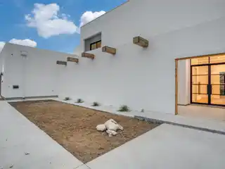 Modern Spanish Mission Estate on a Creek Lot