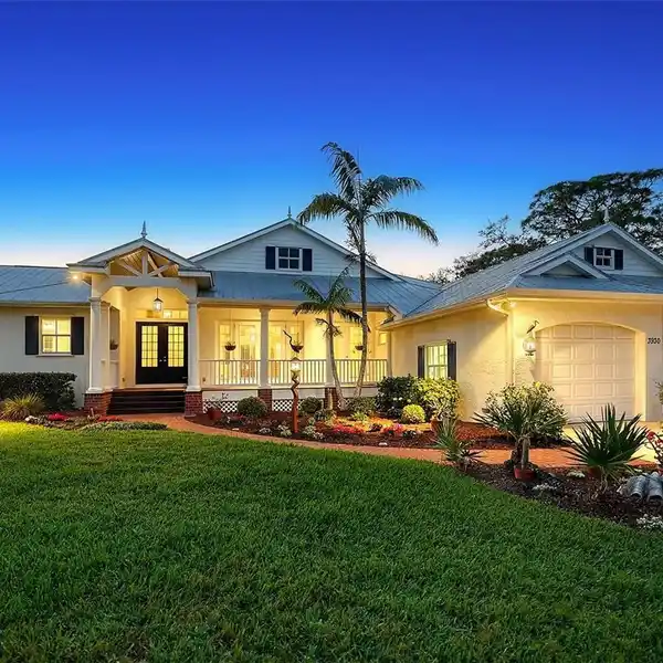 EXQUISITE CUSTOM-BUILT COASTAL HOME IN A GATED WATERFRONT COMMUNITY