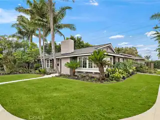 Single-Level Stunner with Tropical Backyard Oasis
