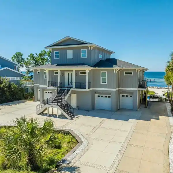 WATERFRONT POOL HOME IN THE DEER POINT SUBDIVISION