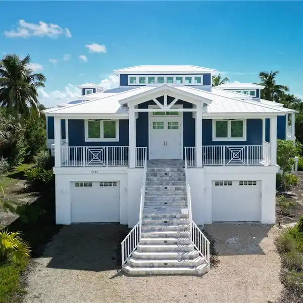 ELEVATED CUSTOM HOME ON THE SANIBEL RIVER