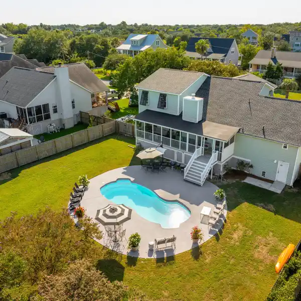 A TRULY TURN-KEY EXPERIENCE ON A QUIET, LUSH LOT