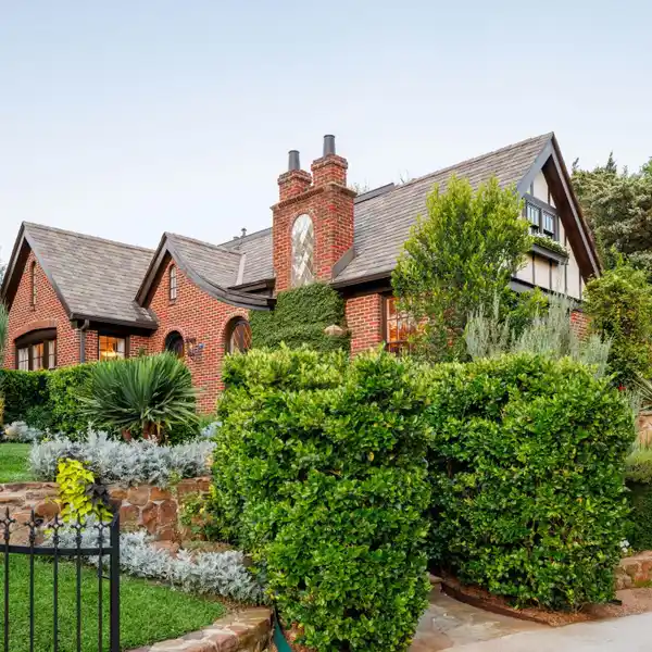 HISTORIC TUDOR GEM WITH RESORT-STYLE OUTDOOR LIVING