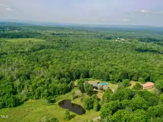 Exceptional Private Estate Nestled on Picturesque Acres