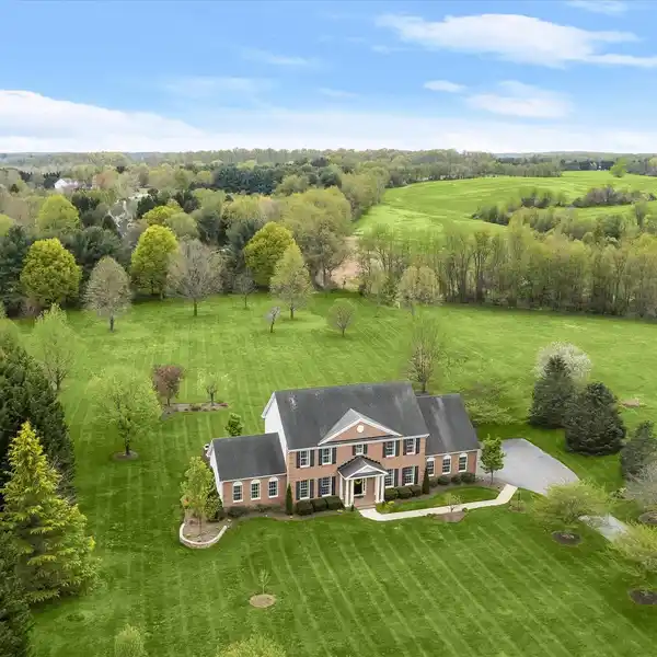CLASSIC CHARM MEETS MODERN LUXURY ON THREE ACRES