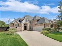UPDATED CUSTOM HOME IN GOLF COURSE COMMUNITY