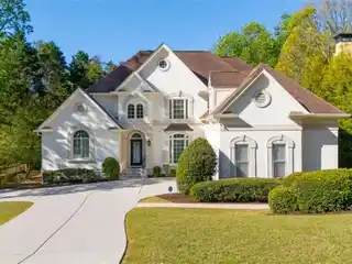 Spacious and Stylish Home with Private Wooded Backyard