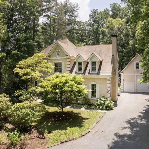 LOVELY HOME ON A BEAUTIFULLY LANDSCAPED LOT