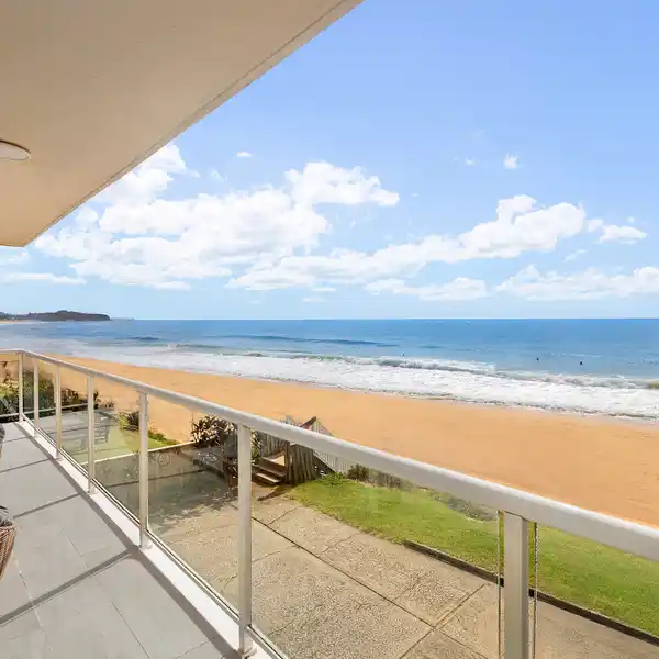 BEACHFRONT ELEGANCE WITH UNINTERRUPTED OCEAN VISTAS