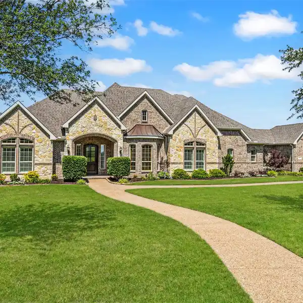 SINGLE-STORY ESTATE ON A TREED ACRE