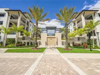 Elevated Living in Prestigious Naples Square