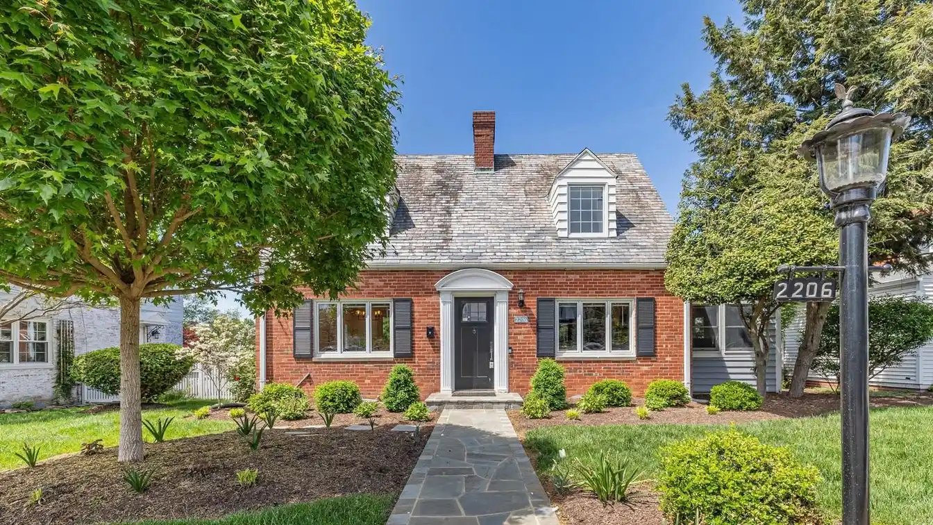 Timeless Brick Beauty on Quiet Tree-lined Street