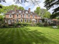 NOTABLE HAROLD FALKNER COUNTRY MANOR HOUSE IN AN ATTRACTIVE WILLIAM & MARY STYLE