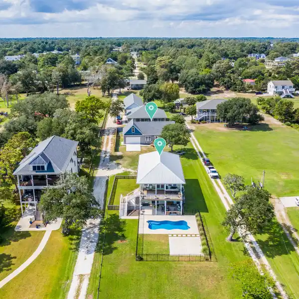 TWO WATERFRONT HOMES ON 1.4 ACRES