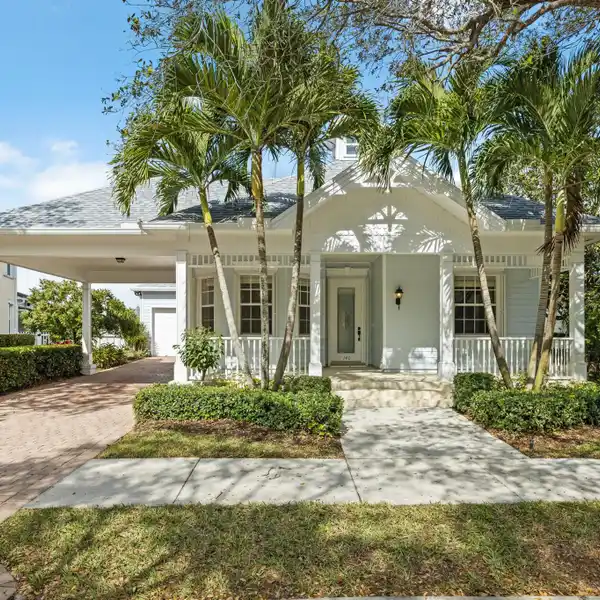 SINGLE-STORY WITH SWEEPING WATER AND GOLF VIEWS
