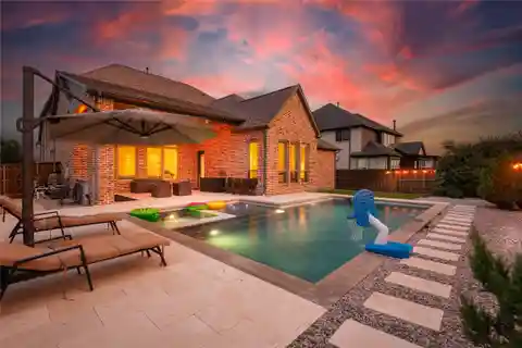 Custom Stunner with Pool in Windsong Ranch