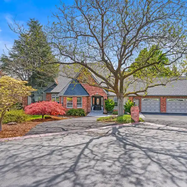 A TRUE MASTERPIECE IN A DESIRABLE GATED COMMUNITY