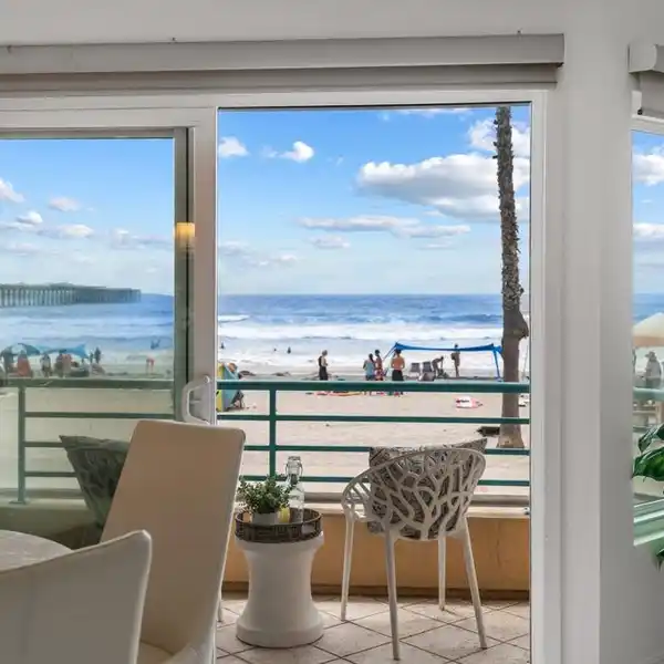 BEACHFRONT GEM IN THE COVETED COMMUNITY