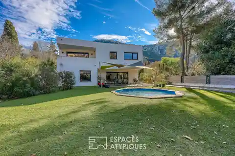 Contemporary Villa Nestled in a Green Setting