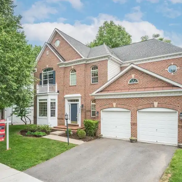 SUN-FILLED COLONIAL WITH RARE FLOOR PLAN