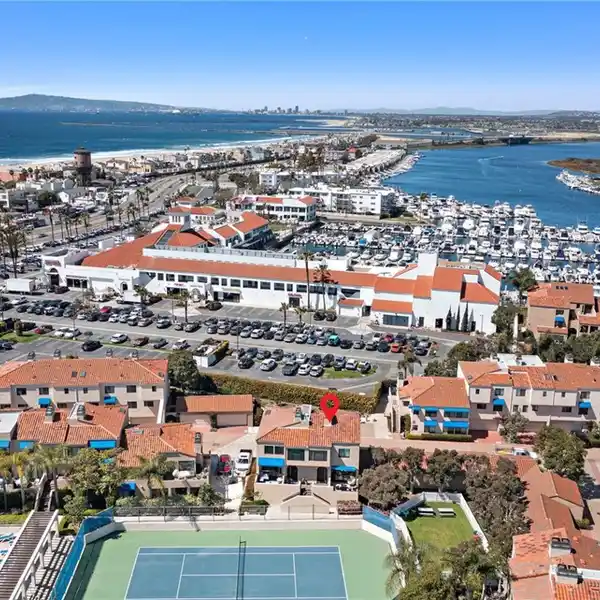 FINE CONDOMINIUM IN A SOUGHT-AFTER GUARD GATED ENCLAVE
