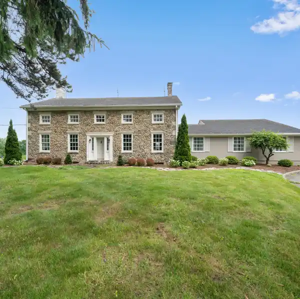 CONTEMPORARILY RENOVATED 1856 COBBLESTONE FARMHOUSE