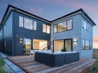 Architectural Coastal Haven with Soaring Cathedral Ceilings