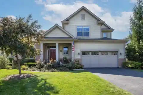 Sun-Filled Interiors with Hardwood Floors Throughout