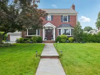 Beautifully Updated and Expanded Brick Colonial