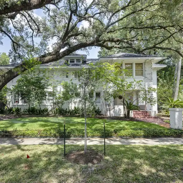 1930S DUPLEX WITH MODERN UPDATES AND POTENTIAL