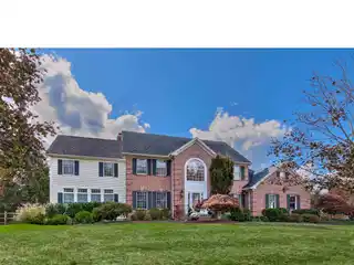 Exquisite six Bedroom Center Hall Colonial