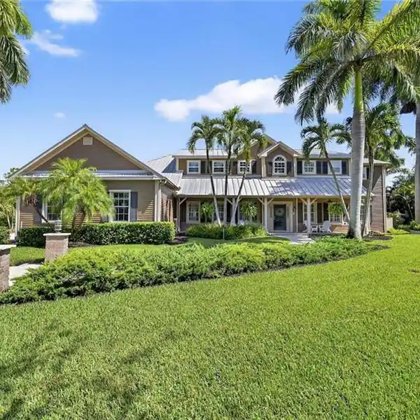 GATED CUSTOM HOME WITH FIVE-CAR GARAGE