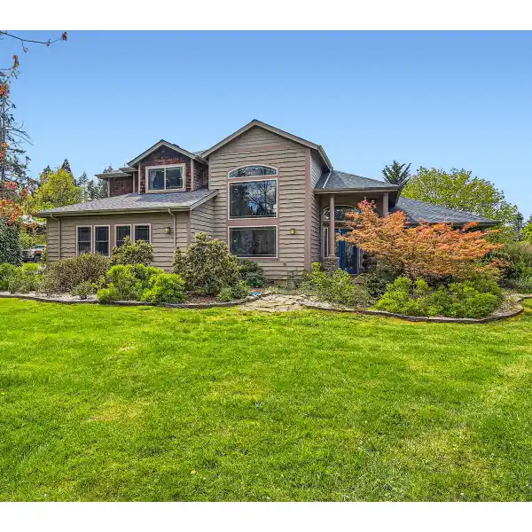 BEAUTIFUL HOME WITH SHOP ON OVER THREE ACRES