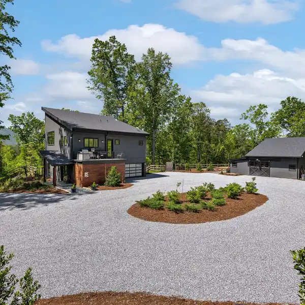 BEAUTIFUL MODERN HORSE FARM WITH LAKEFRONT LOT