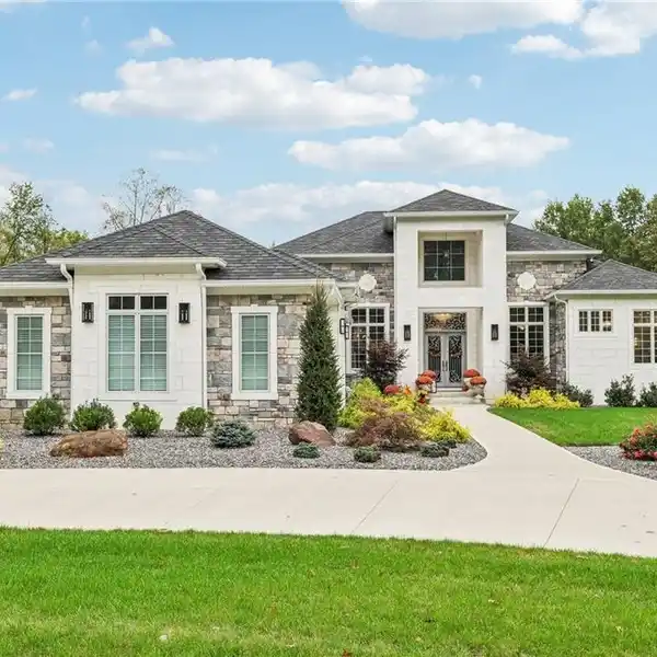 SPECTACULAR STONE RANCH STYLE HOME