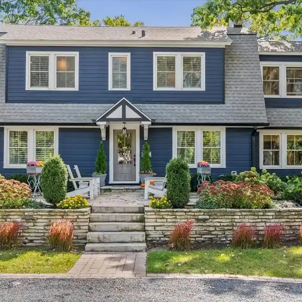 CHARMING HOME WITH CIRCULAR DRIVE AND LANDSCAPING